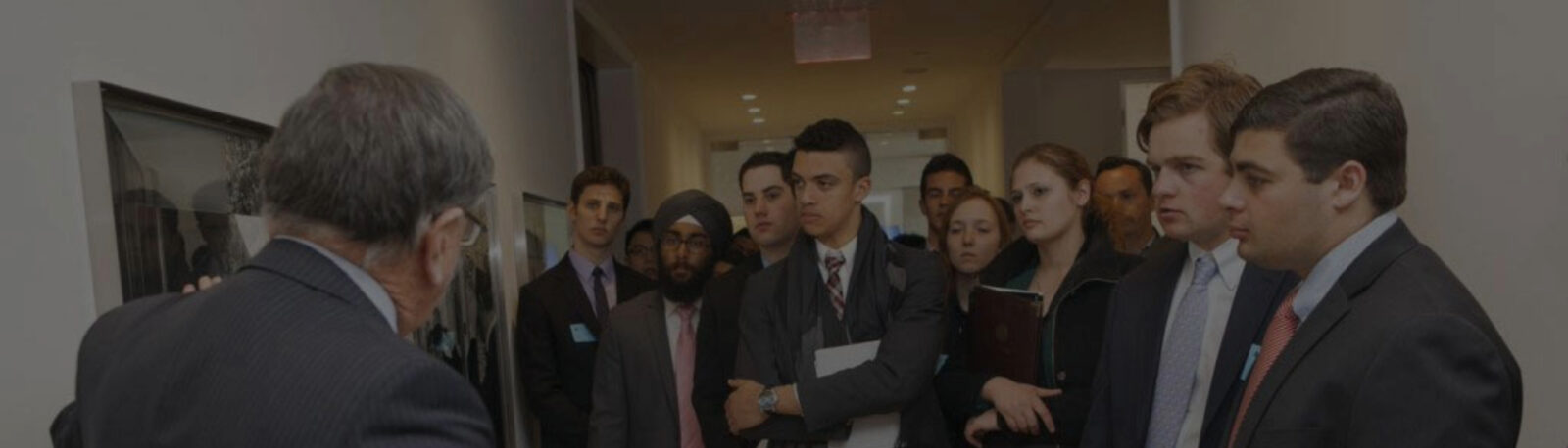 Students listening to an alumnus.